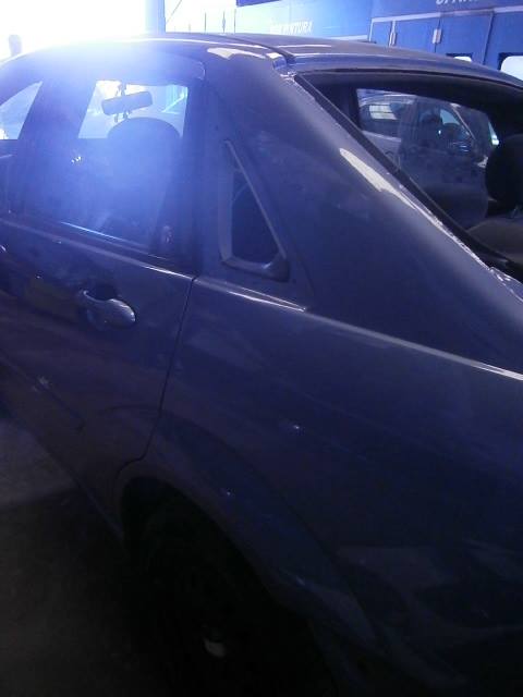 Reparación Ford Focus en Talleres Axarquía. ford focus verde, talleres axarquia, reparacion automovil, chapa y pintura, reparacion, taller concertado, taller cha y pintura, velez malaga,